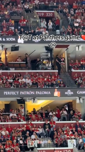 Taylor Swift and Travis Kelce cuddling at Stanley Cup