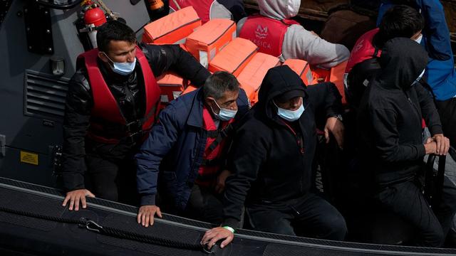 Men thought to be migrants who undertook the crossing from France in small boats and were picked up in the Channel on 17 June 2022. | Copyright AP Photo/Matt Dunham Men thought to be migrants who undertook the crossing from France in small boats and were picked up in the Channel on 17 June 2022. | Copyright AP Photo/Matt Dunham